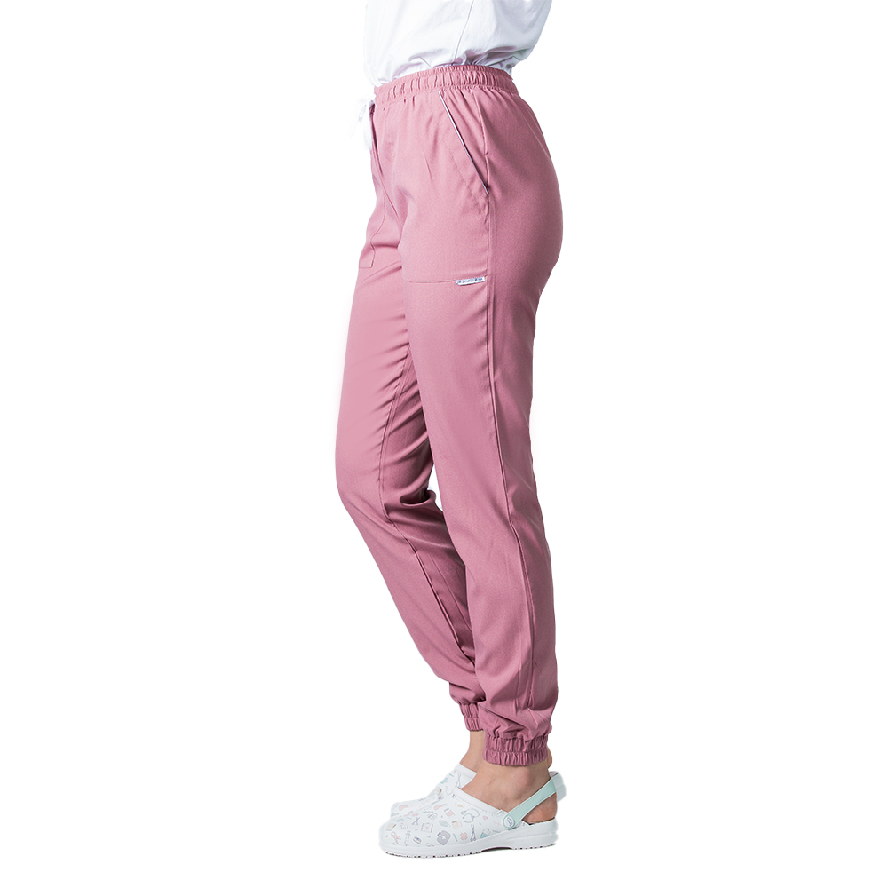 Costum medical stretch roz pudrat, cu bluza kimono cu paspol alb si pantaloni tip jogger